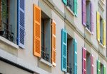 Windows with different color shutters. Geneva, Switzerland - image