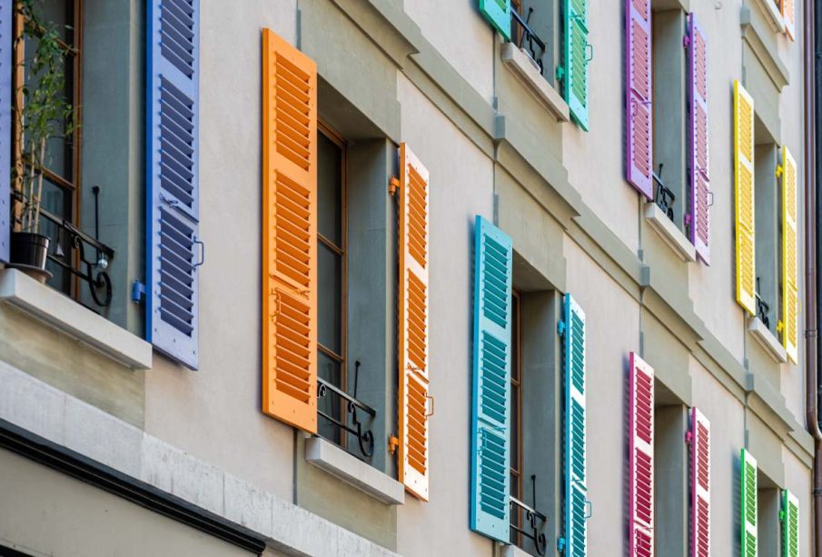 Windows with different color shutters. Geneva, Switzerland - image