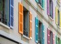 Windows with different color shutters. Geneva, Switzerland - image